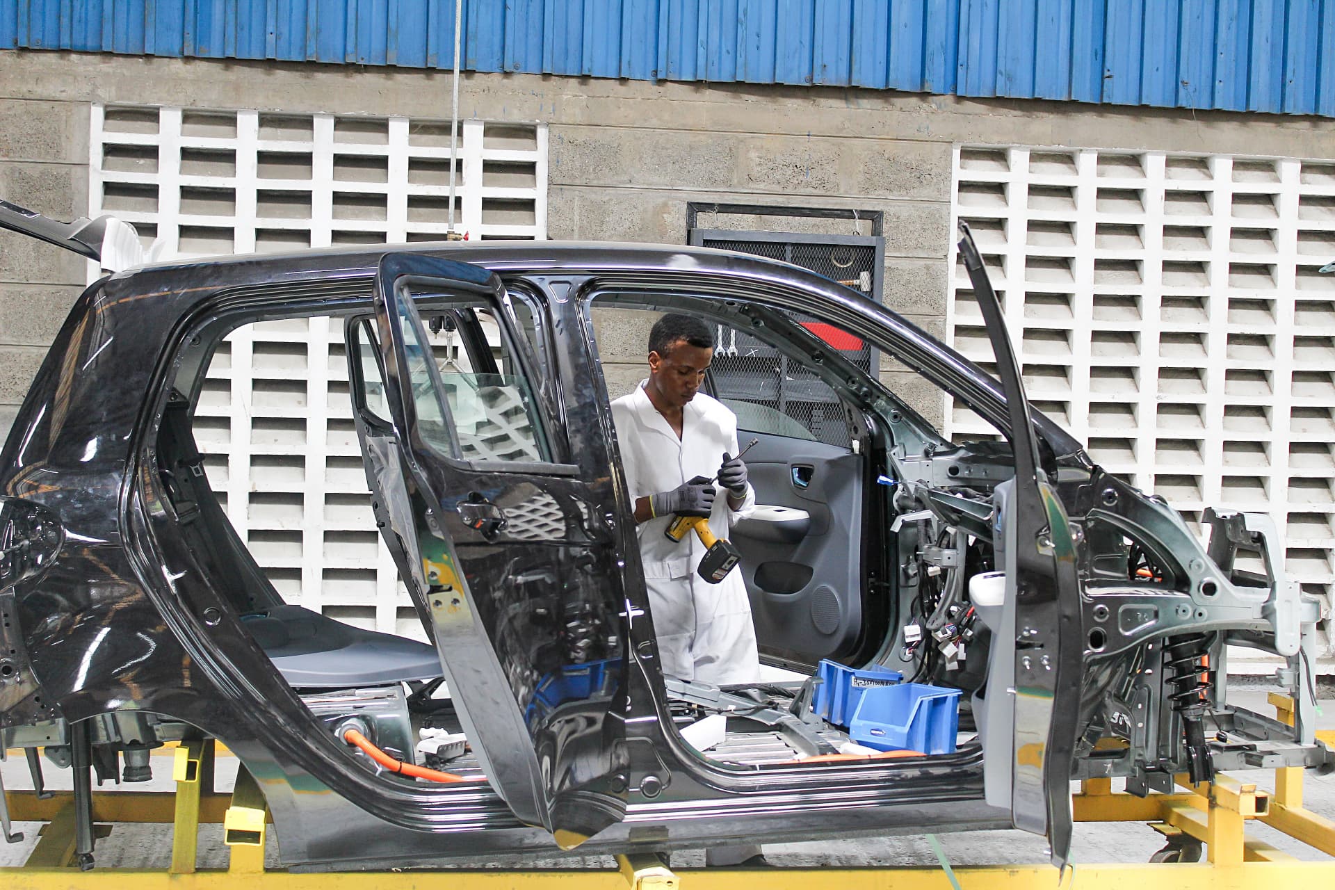 Technician fitting a vehicle interior at AVA