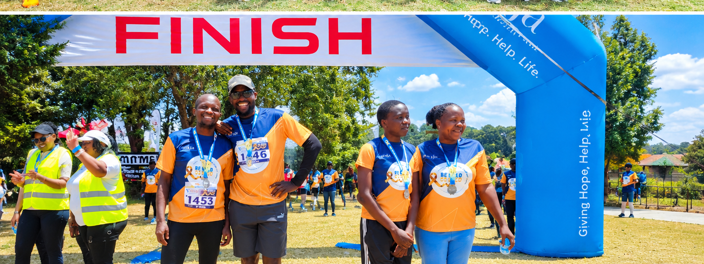 Team Simba at the finish arch of the Be Bold Go Gold Walk and Run