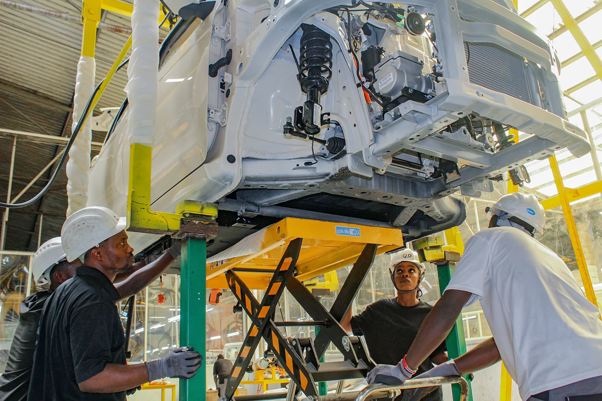 AVA technicians inspecting a vehicle chassis