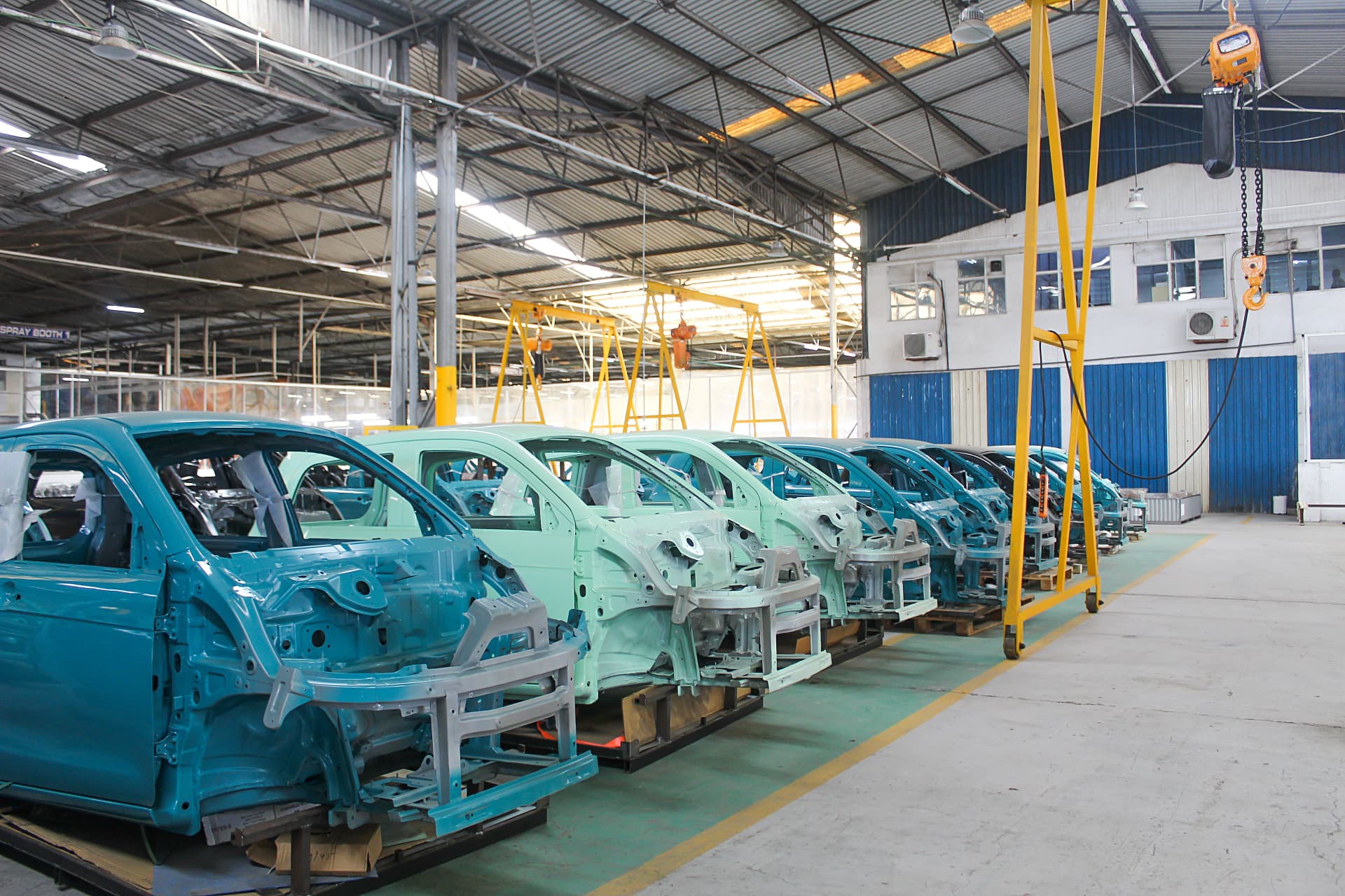 Vehicle bodies progressing along the AVA production line