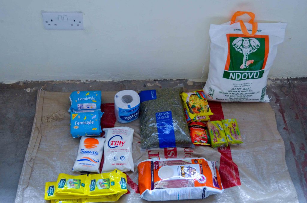 Contents of a Simba Foundation food parcel laid out before packing
