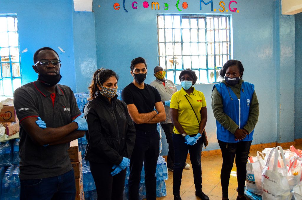 Simba Foundation team and partners at a food relief distribution